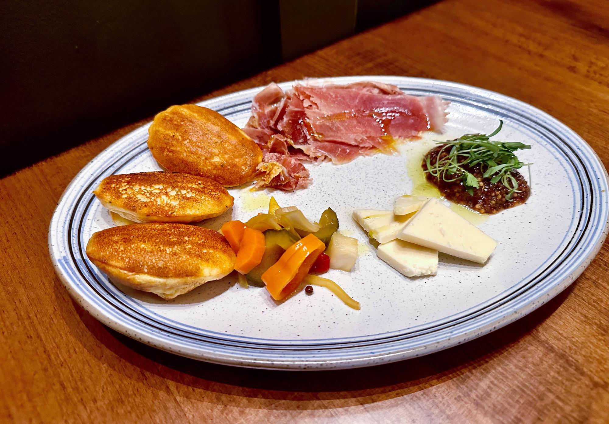 white plate with charcuterie variety